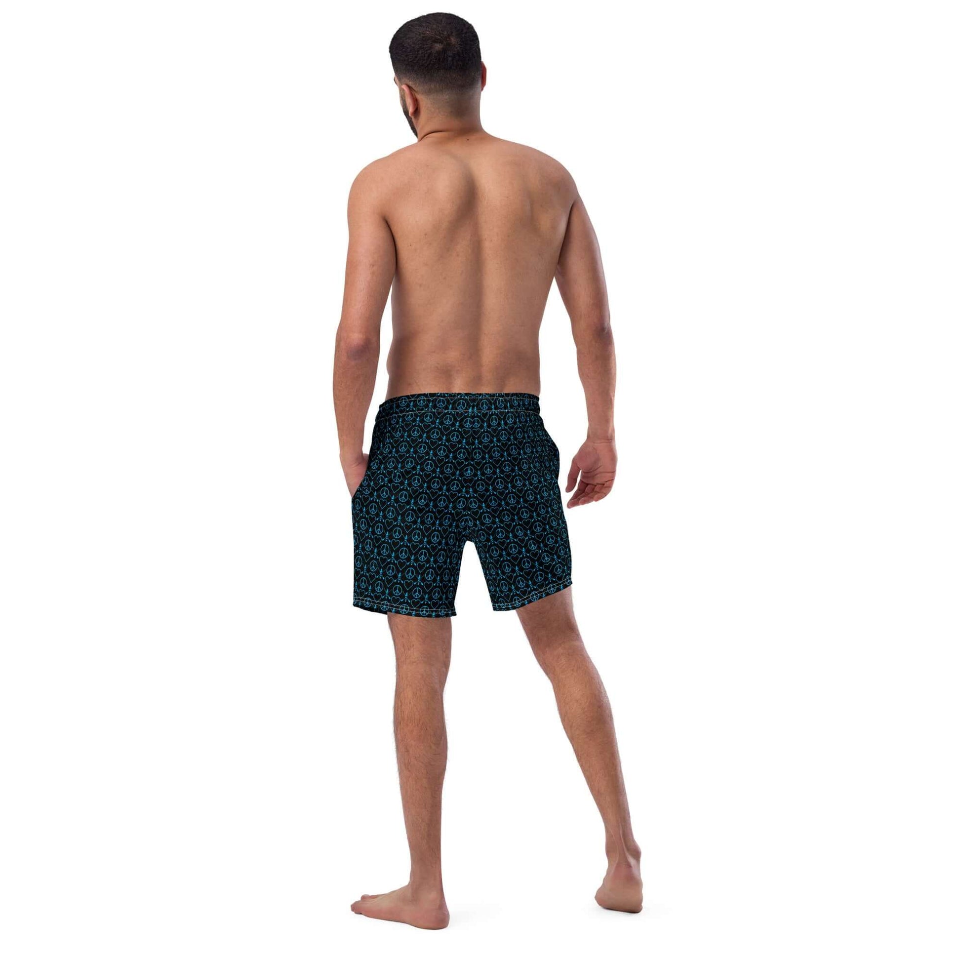 Man wearing Recycled Peace Love Paddleboard Swim Trunks, showcasing stylish design and comfortable fit for summer.
