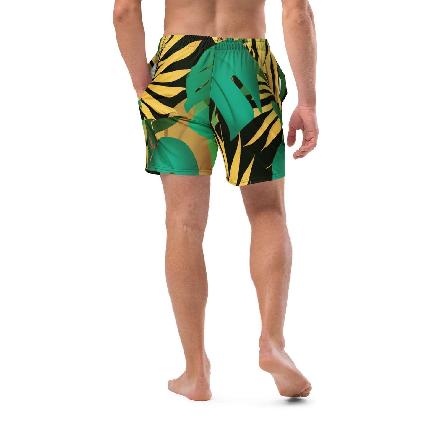 Men's tropical camo swim trunks with vibrant green and yellow leaf patterns, perfect for summer fun.