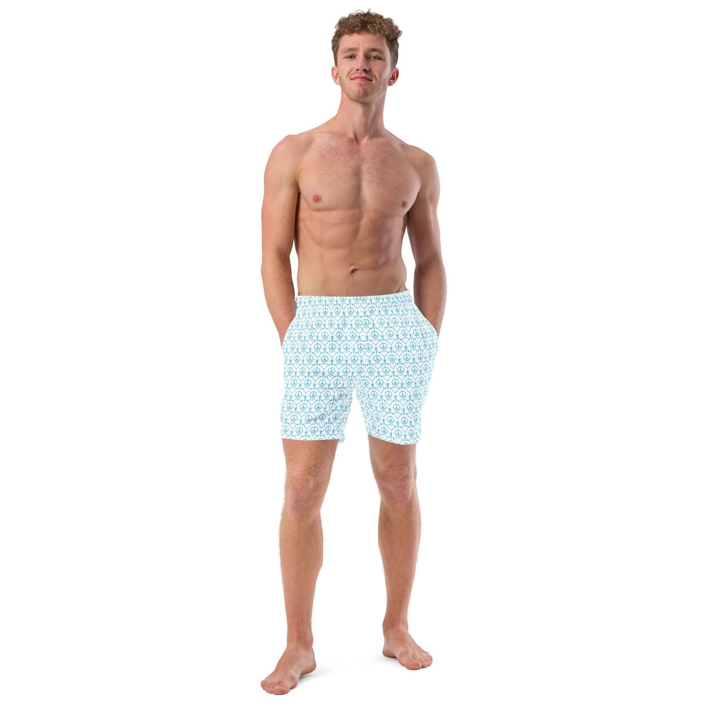 Man modeling Recycled Peace Love Paddleboard Swim Trunks in white, perfect for summer fun and quick-drying comfort.