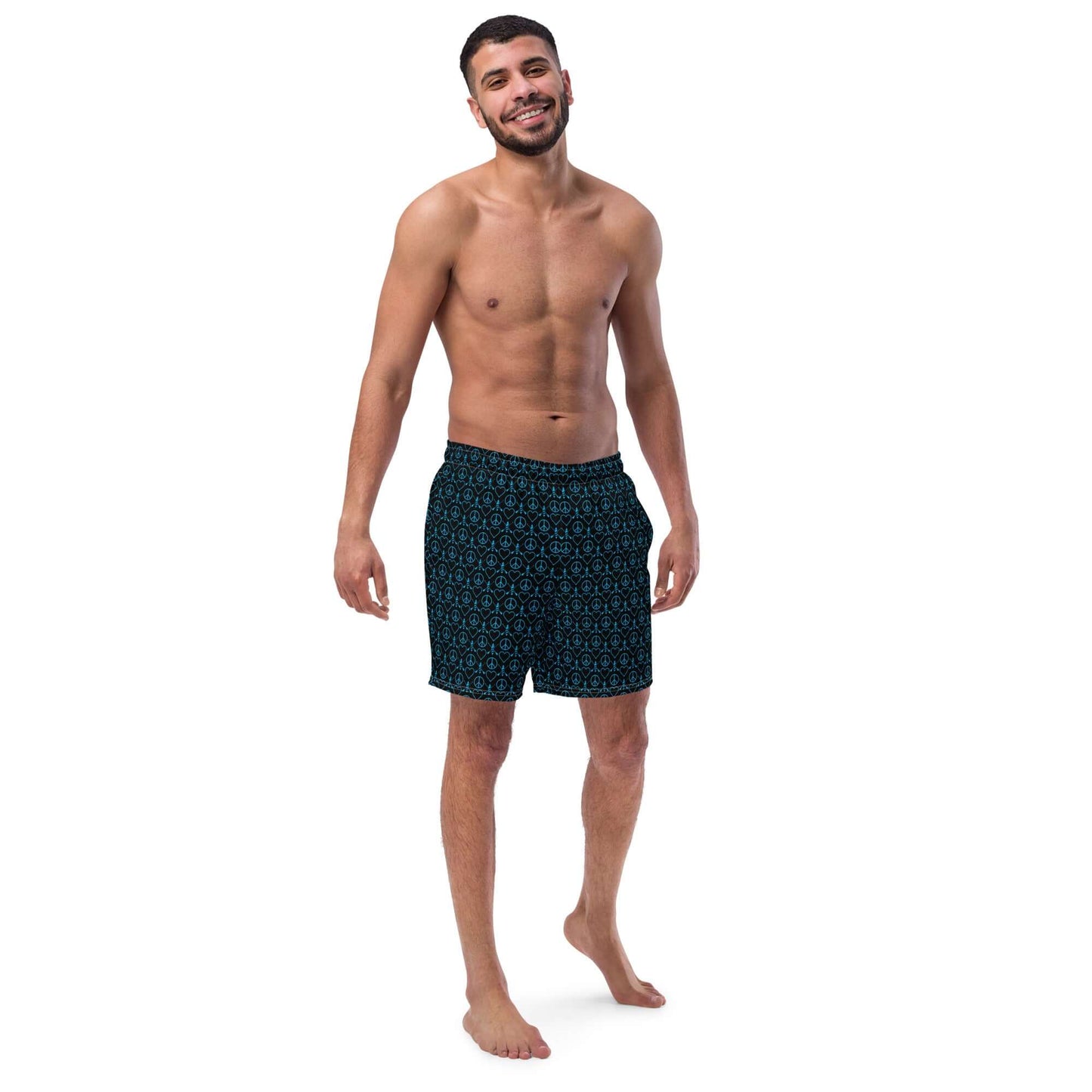 Man wearing recycled peace love paddleboard swim trunks, perfect for summer fun and beach days.