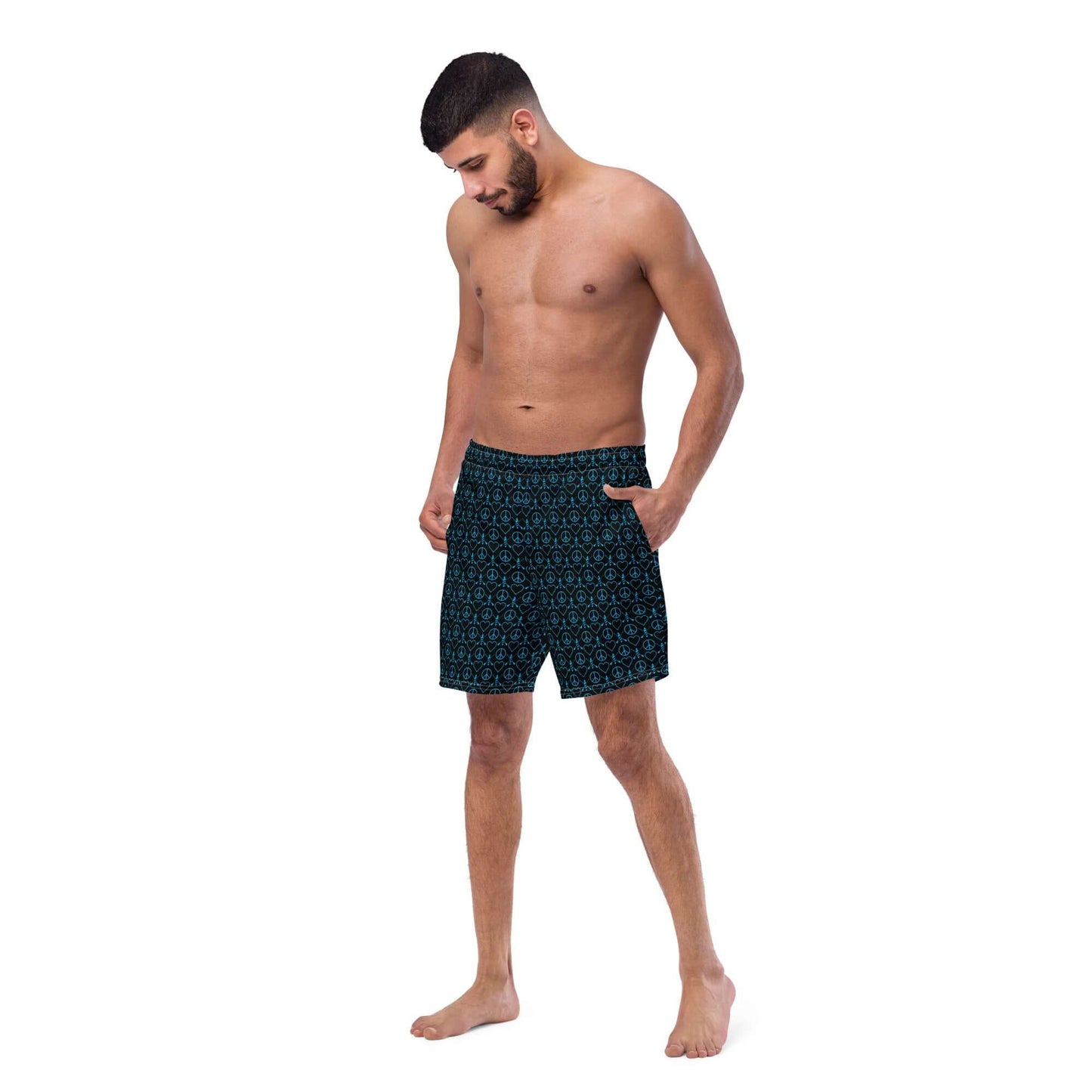 Model wearing Recycled Peace Love Paddleboard Swim Trunks, showcasing their stylish design and comfort for summer days.