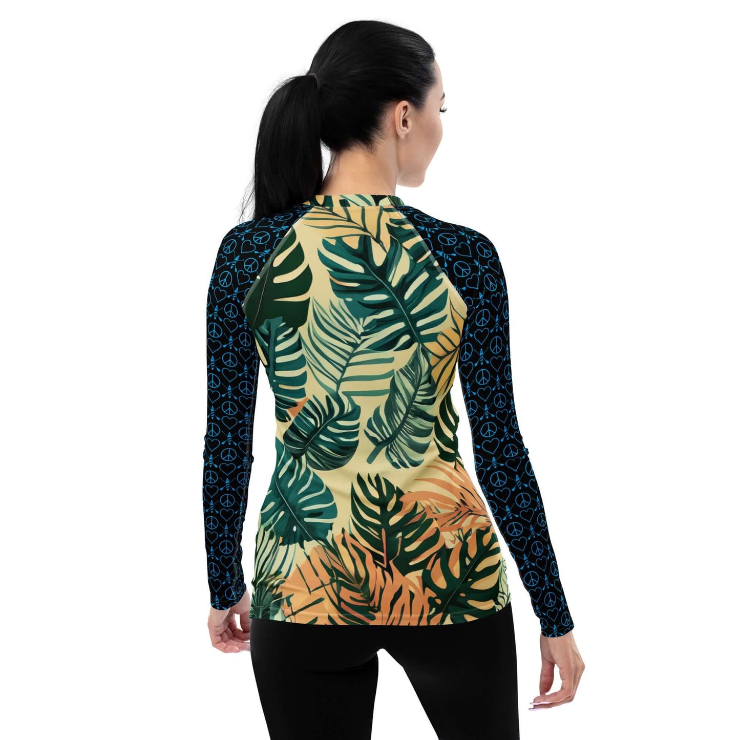 Back view of Women's Peace Love Paddleboard Rash Guard in tropical leaf design, ideal for active outdoor sports.