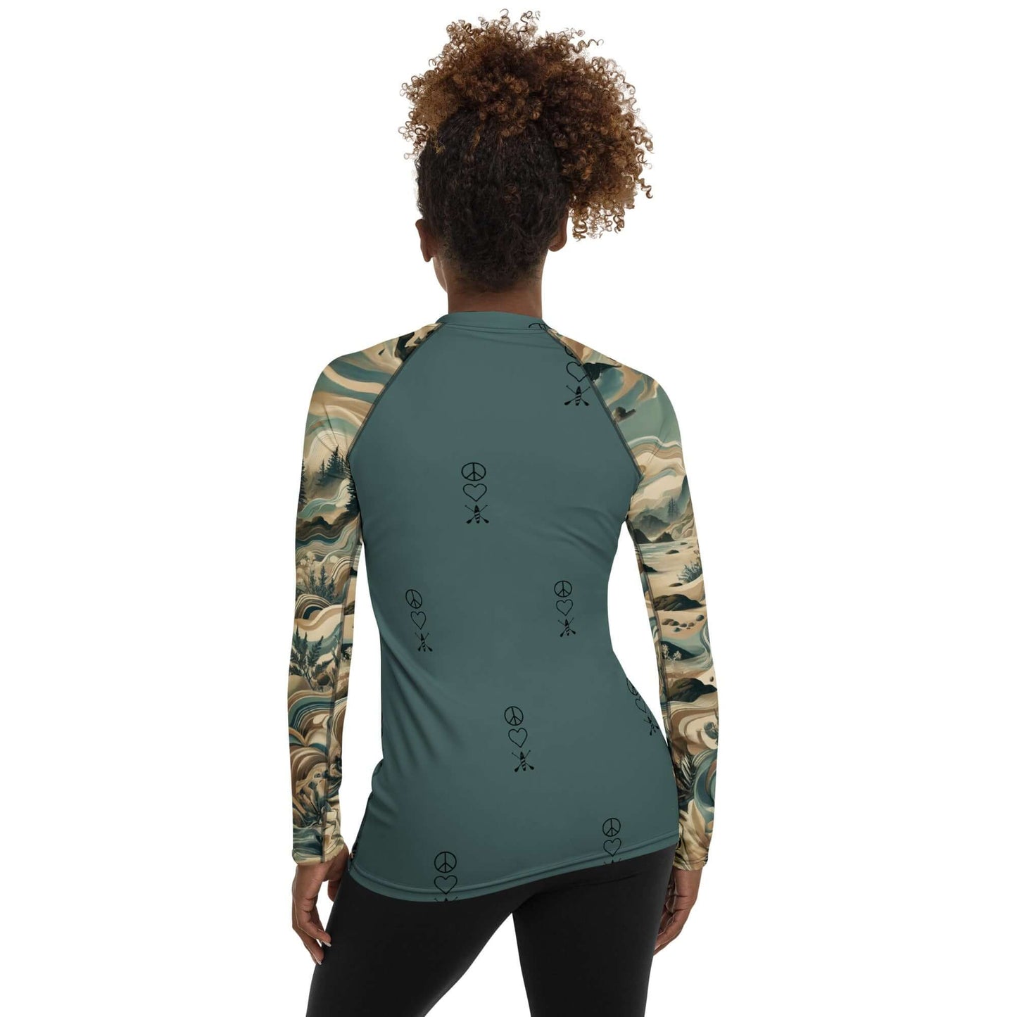 Back view of women's long-sleeve PNw pattern rash guard, featuring vibrant designs and a slim fit for active wear.