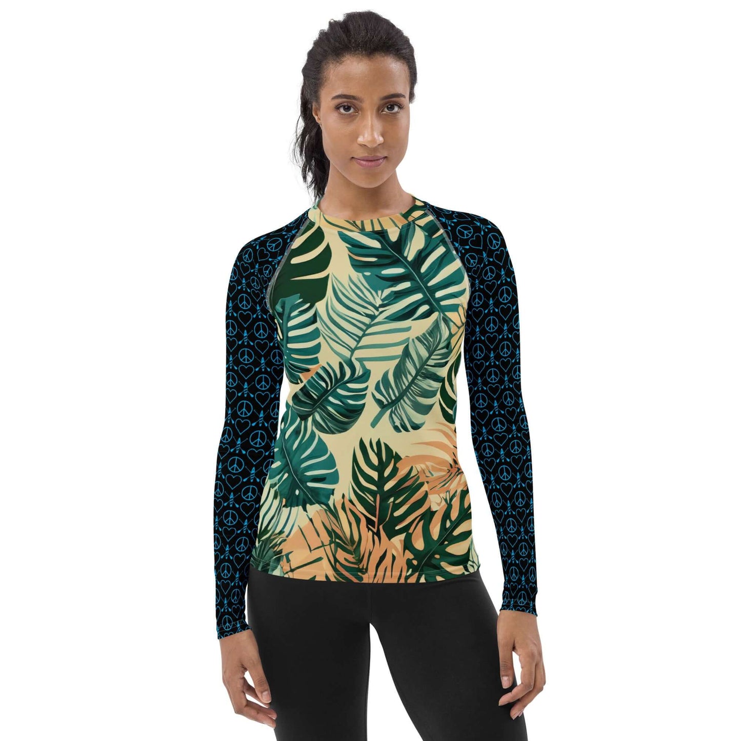 Women's long-sleeve rash guard with tropical leaf pattern, perfect for active outdoor sports.