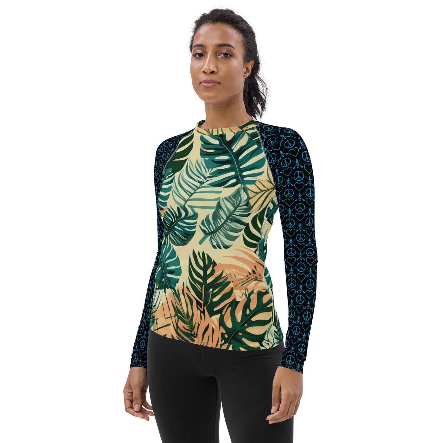 Women in a tropical leaf long-sleeve rash guard, perfect for outdoor sports and sun protection.